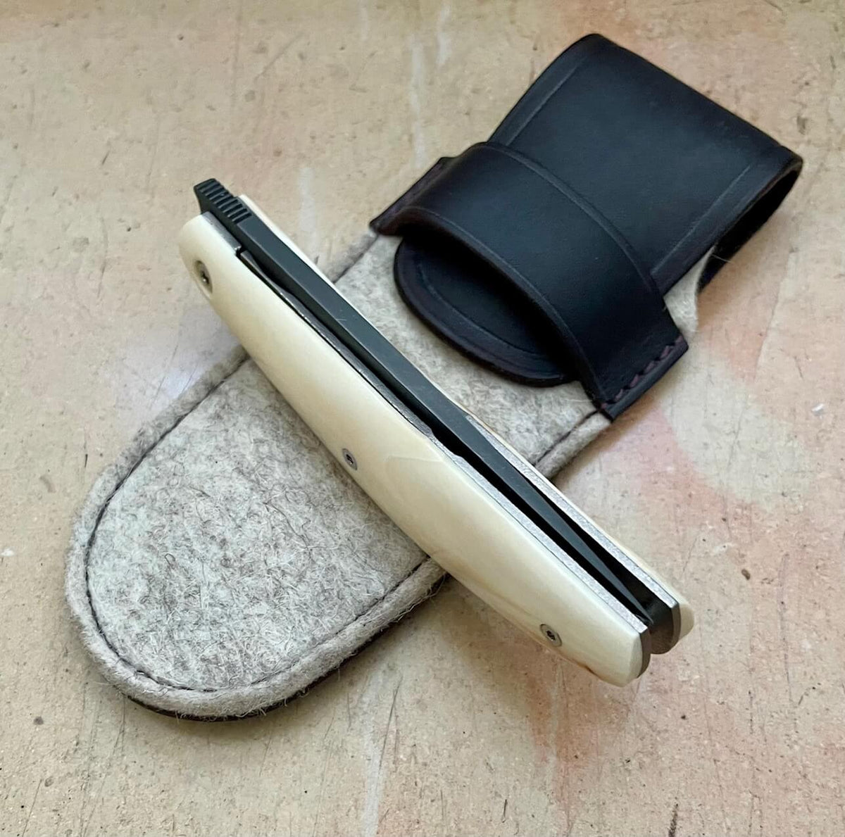 Folding knife Michel Grini Kalisse warthog Damascus, view 4