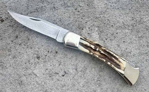 Buck 110 damas cerf